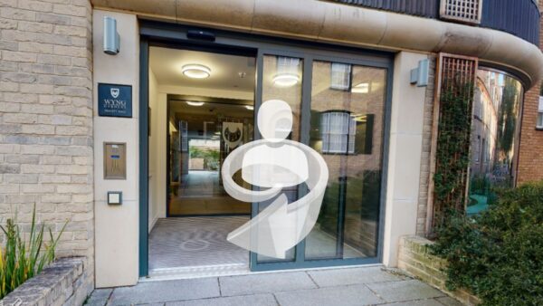 An entrance way into a building. The building is WYNG Gardens, an accommodation block of Trinity Hall in Cambridge