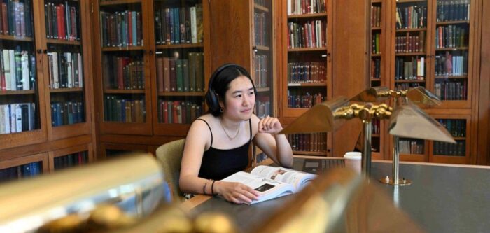 Student sitting in library