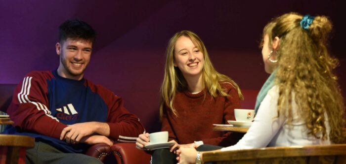 Student chatting in coffee shop