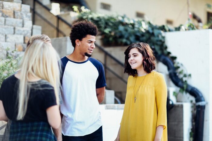 Three students chatting