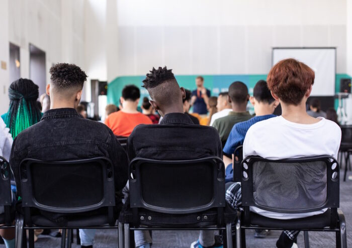 Back of students in a classroom