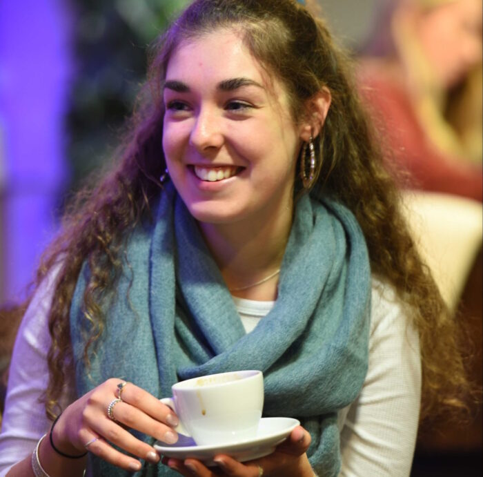 Student enjoying a coffee