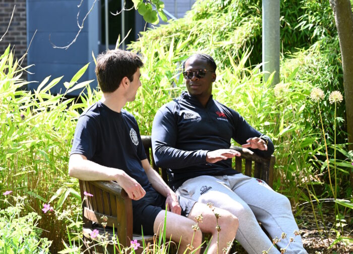 Students sitting on bench at Wychfield