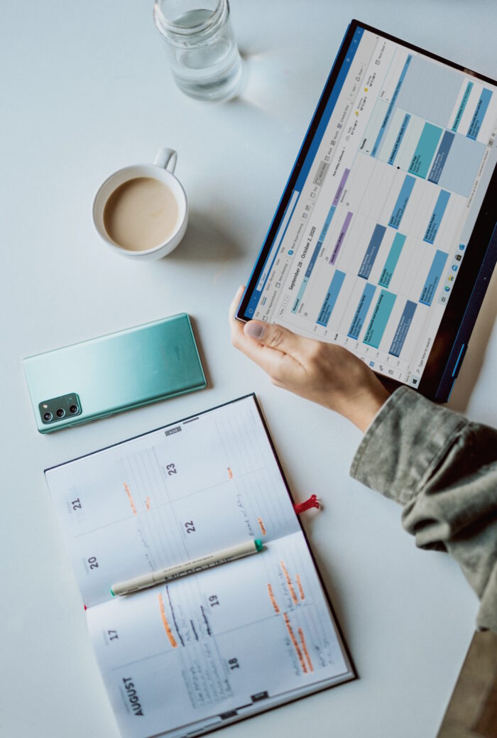 Diary and tablet showing some dates