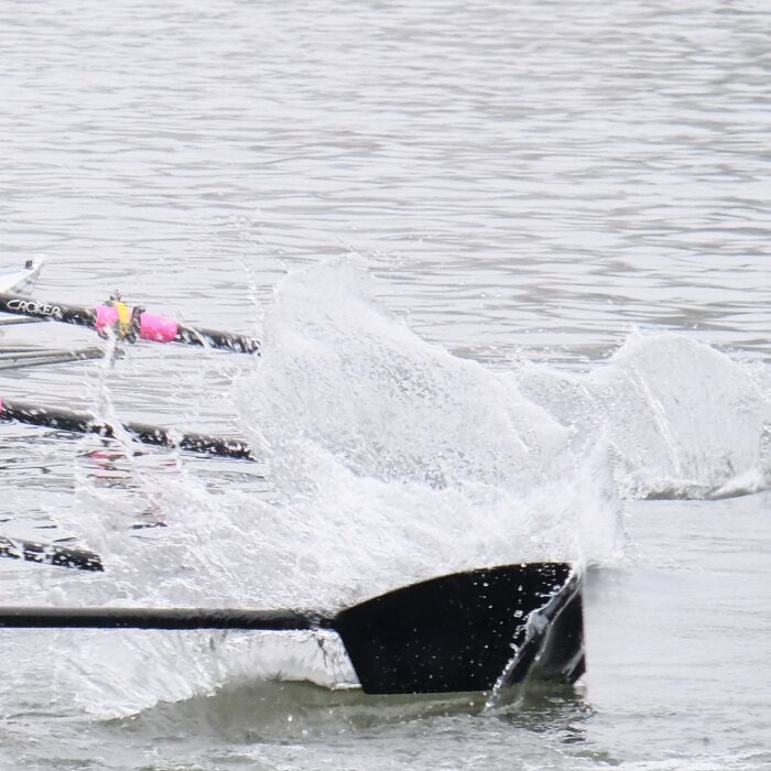 Rowing blades splashing