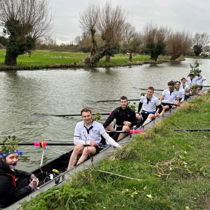 Rowing crew with willow in their hair to show they have bumped up in the Lent Bumps 2024.