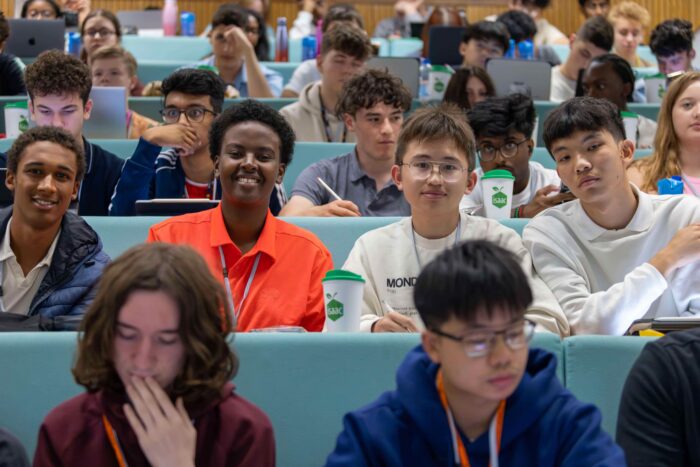 Boys from the 2024 residential sat in a lecture theatre.