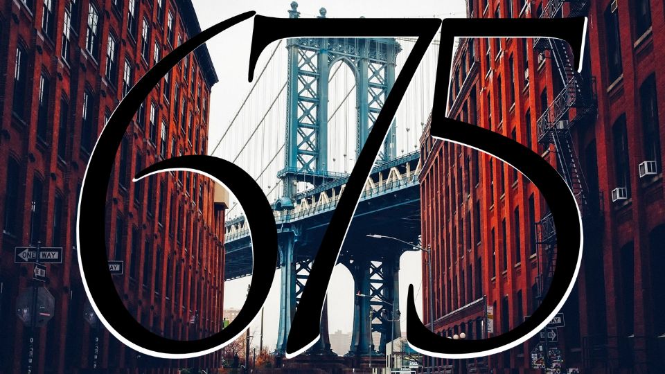 Red brick buildings flank a view of the George Washington Bridge