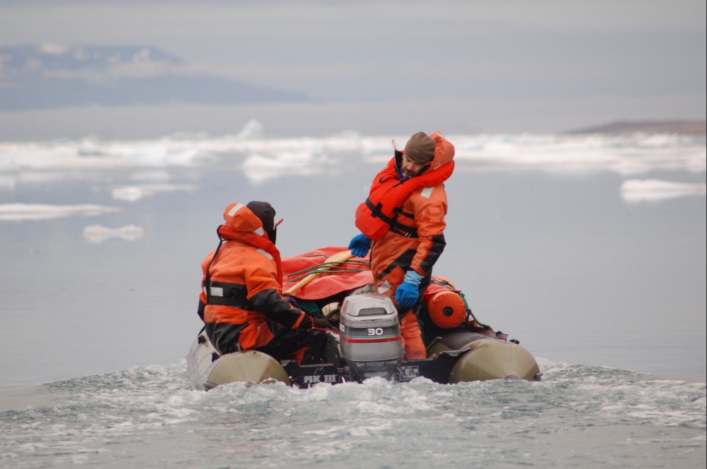 Professor John Marshall night boating in Kejser Franz Joseph Fjord, one of Greenland's largest Fjords.