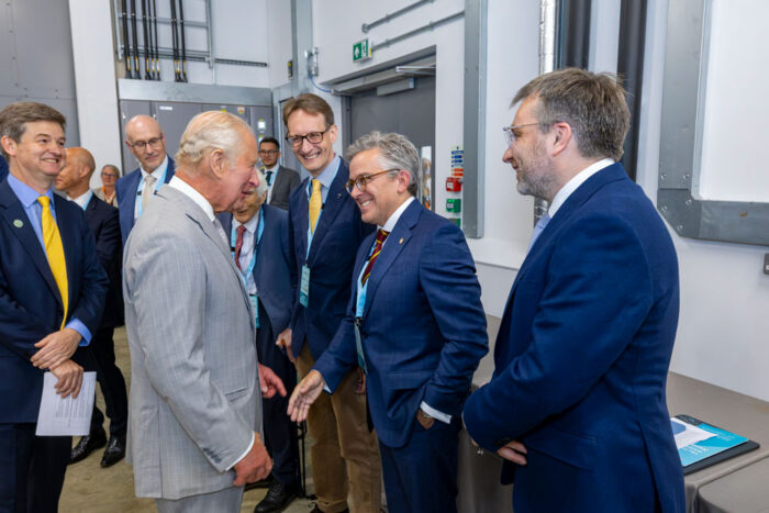 Dr Elliott Grant and His Majesty The King smile and shake hands during the opening of the New Whittle Laboratory. Photo by Ian Jones.
