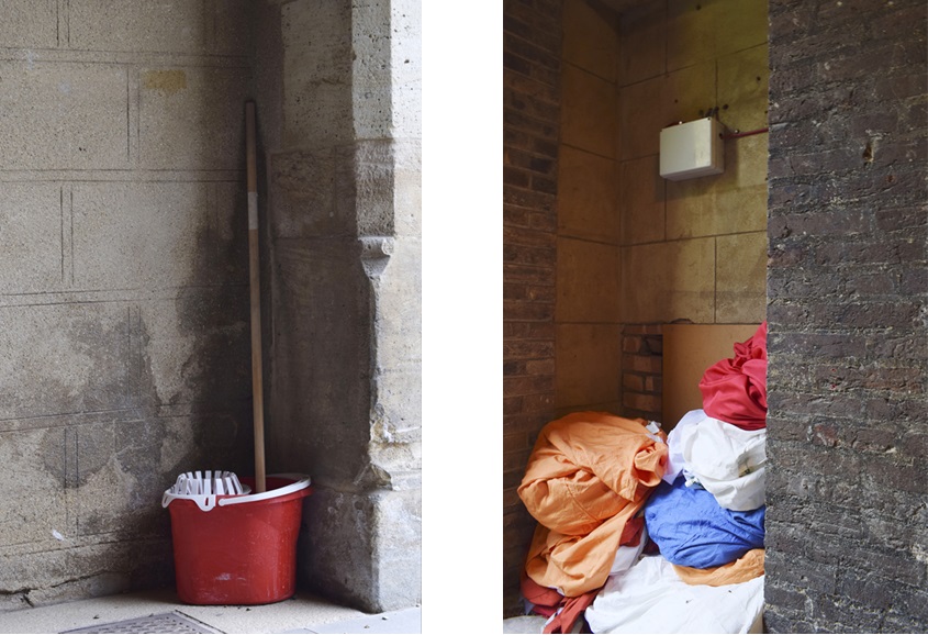 Diptych. Left: a red mop bucket and mop leaning against a stone wall in a covered passageway. Right: a pile of orange, white, blue and red fabric stored in a recessed brick alcove.