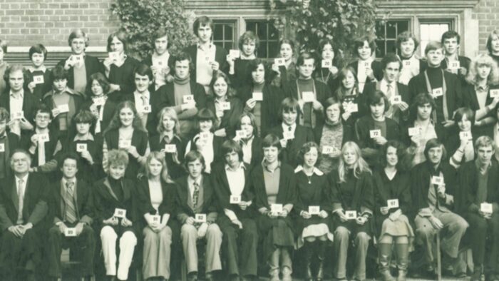 Students lined up in rows for the 1977 matriculation photograph at Trinity Hall.